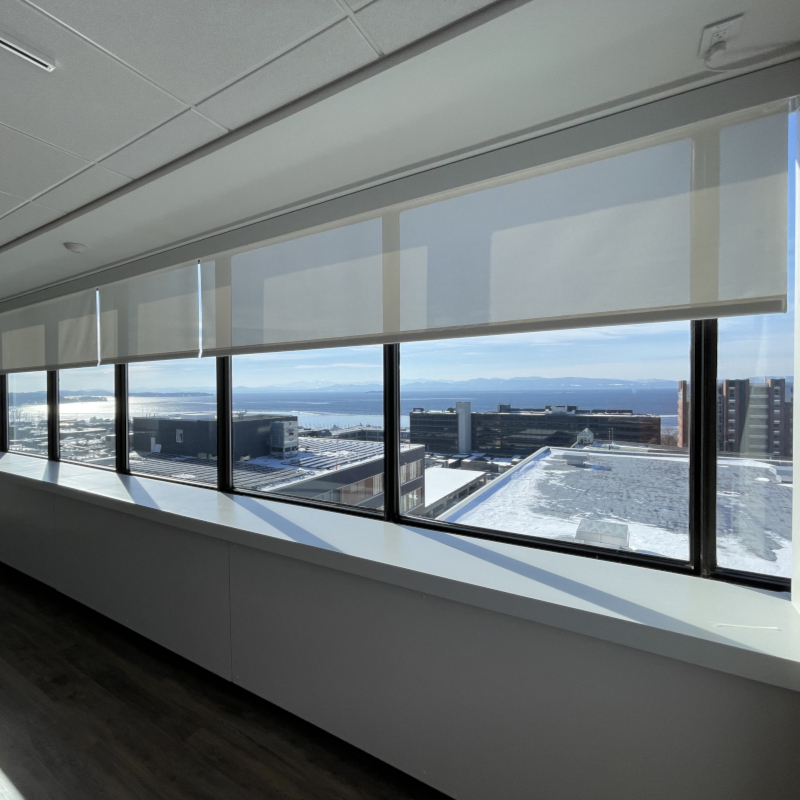 EcoSmart commercial white roller shades windows overlooking Lake Champlain in Vermont
