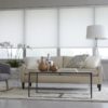 EcoSmart Custom Light-Filtering Transparent White Roller Shade in Living Room